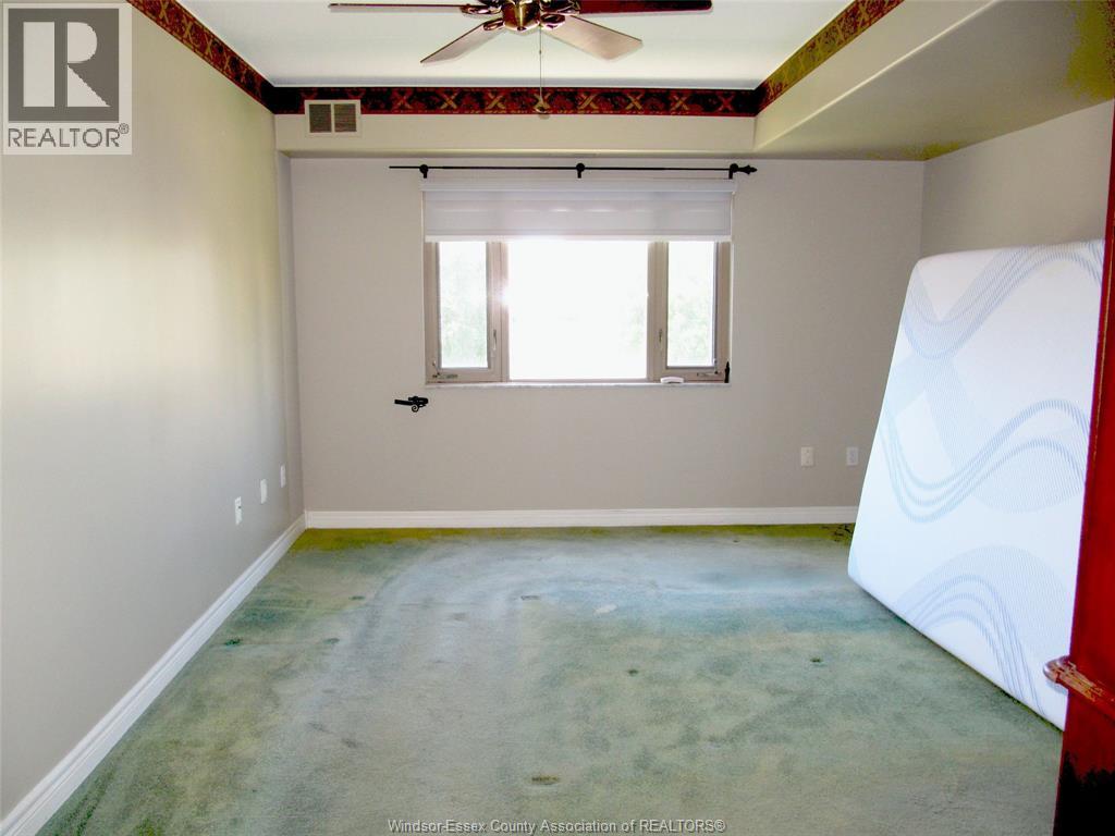 310 Village Grove Drive Unit# 213, Tecumseh, Ontario  N8N 4X7 - Photo 10 - 26014249