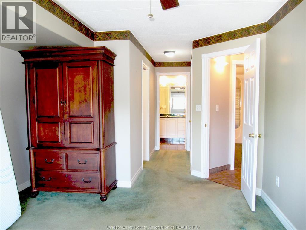 310 Village Grove Drive Unit# 213, Tecumseh, Ontario  N8N 4X7 - Photo 11 - 26014249