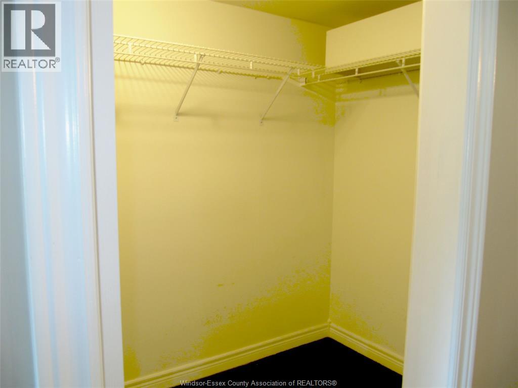 310 Village Grove Drive Unit# 213, Tecumseh, Ontario  N8N 4X7 - Photo 12 - 26014249