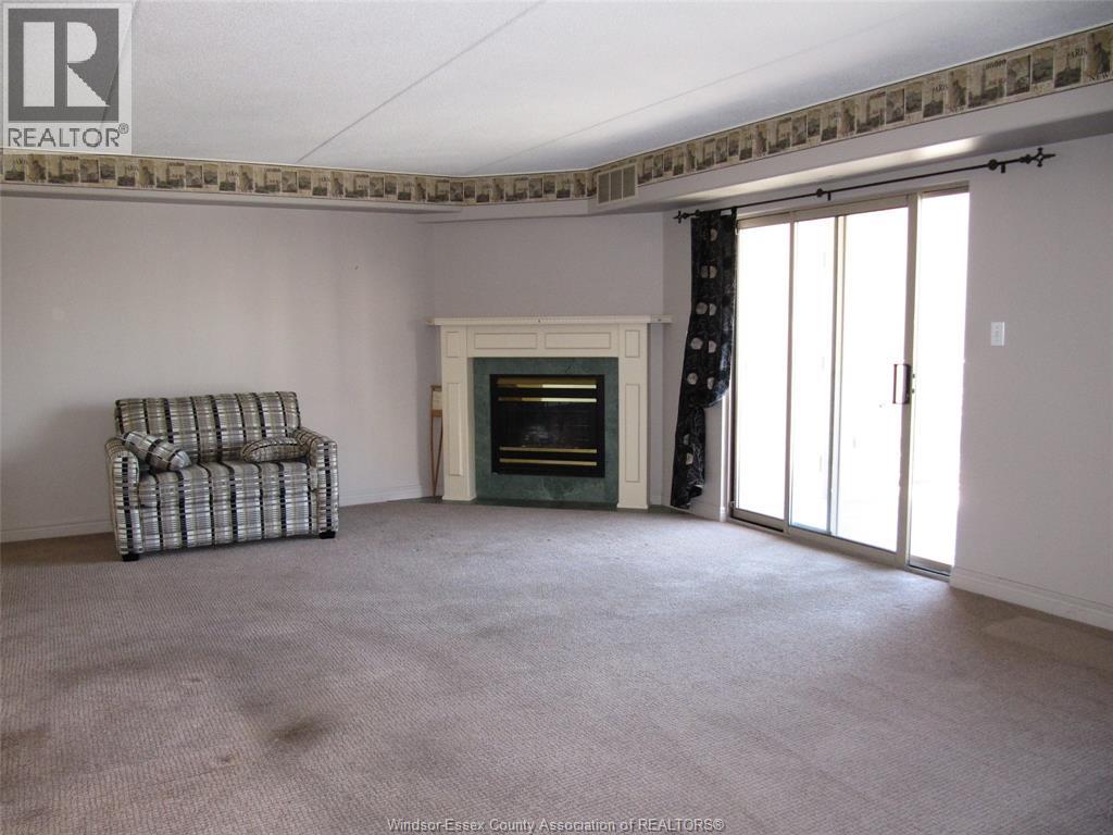 310 Village Grove Drive Unit# 213, Tecumseh, Ontario  N8N 4X7 - Photo 4 - 26014249