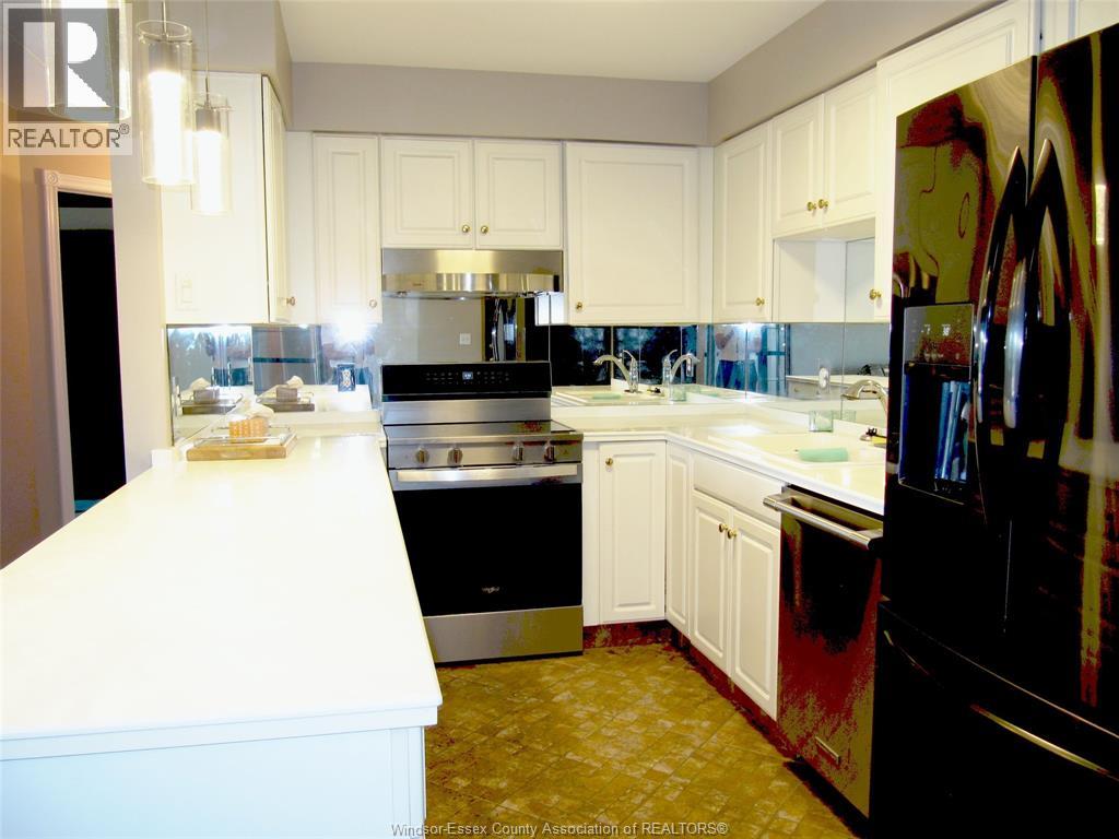 310 Village Grove Drive Unit# 213, Tecumseh, Ontario  N8N 4X7 - Photo 6 - 26014249