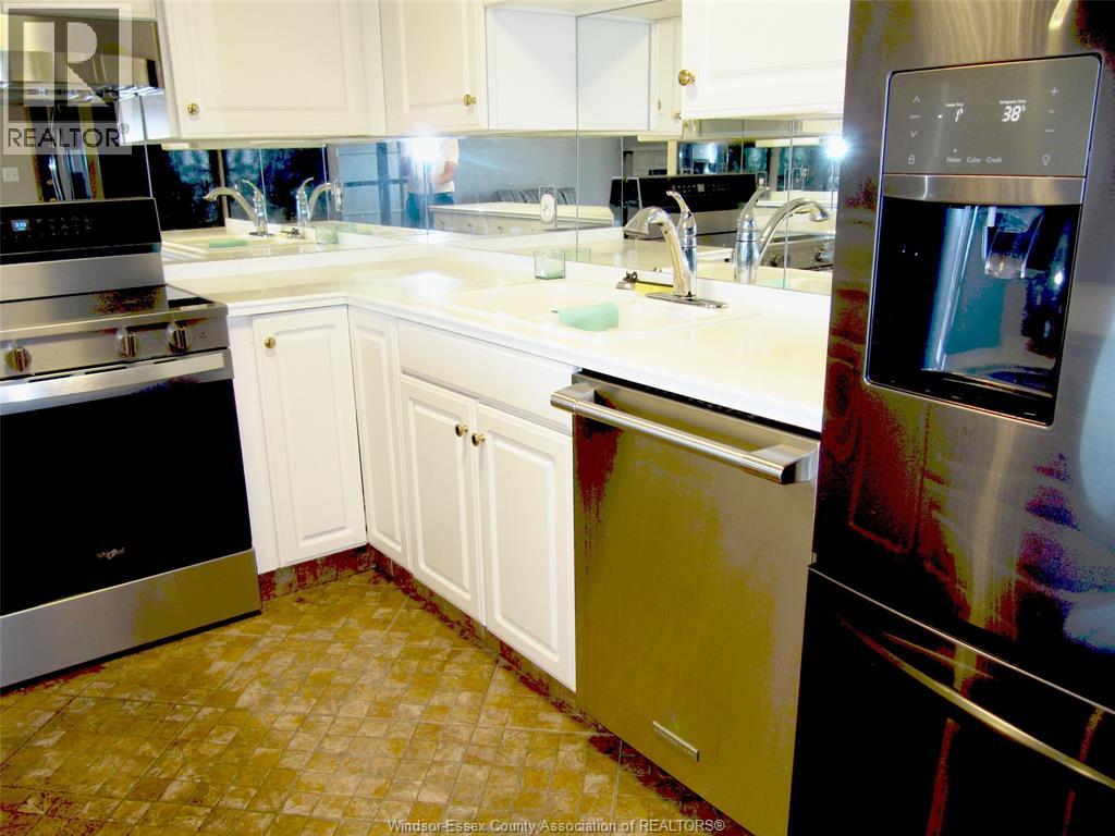 310 Village Grove Drive Unit# 213, Tecumseh, Ontario  N8N 4X7 - Photo 8 - 26014249