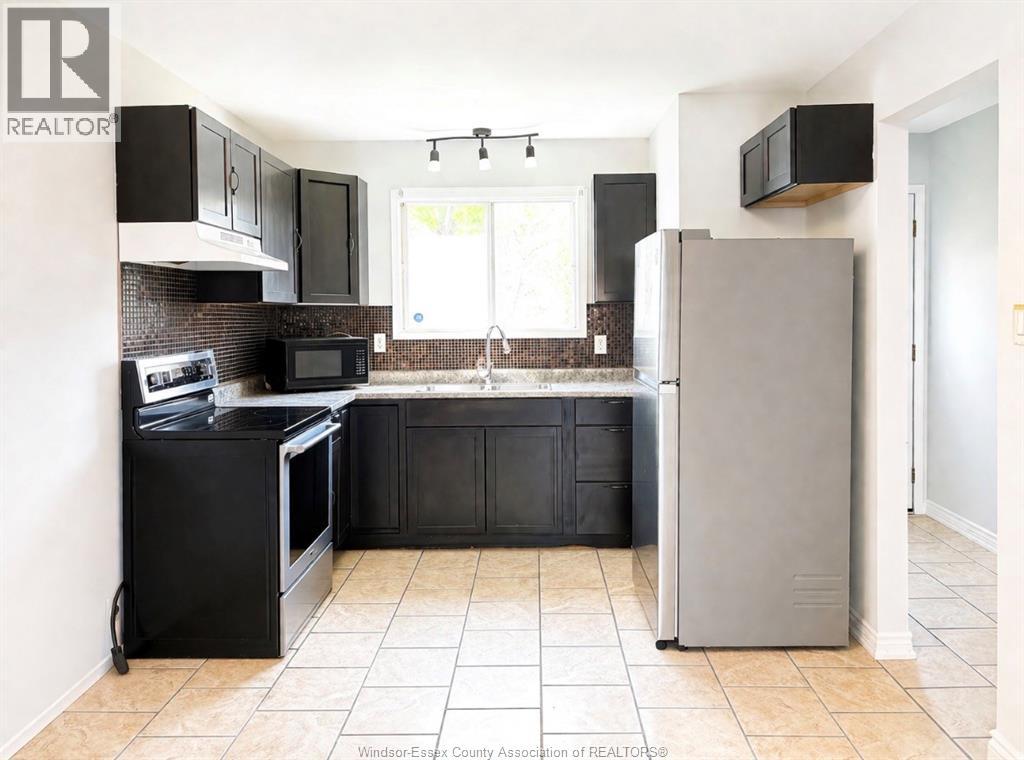 3057 Meadowbrook Lane Unit# 3, Windsor, Ontario  N8T 3C5 - Photo 5 - 26017069