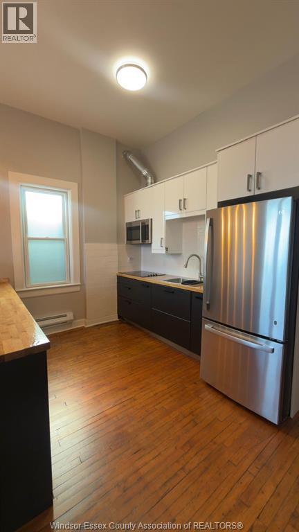 1154 Wyandotte  Street East Unit# Unit #2, Windsor, Ontario  N9A 3K4 - Photo 5 - 26017875