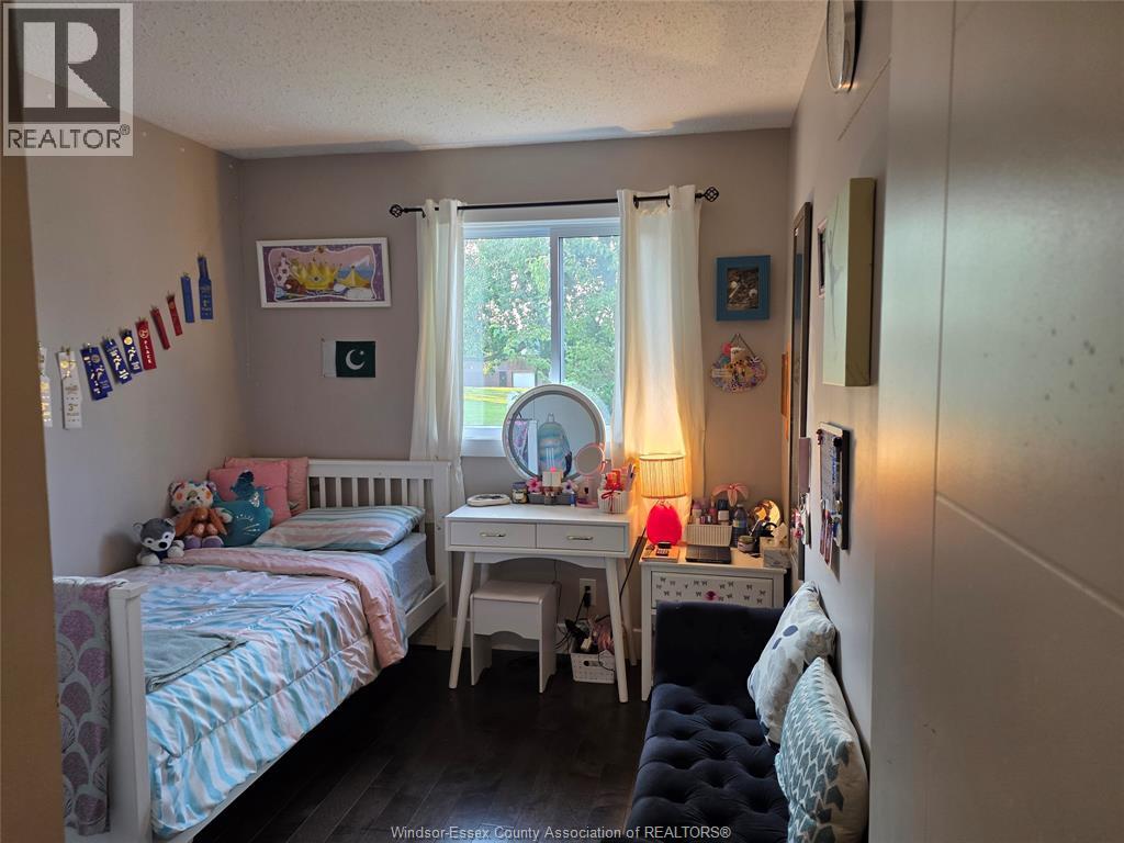 9978 Forest Glade Court Unit# 5, Windsor, Ontario  N8R 2B9 - Photo 3 - 26018136