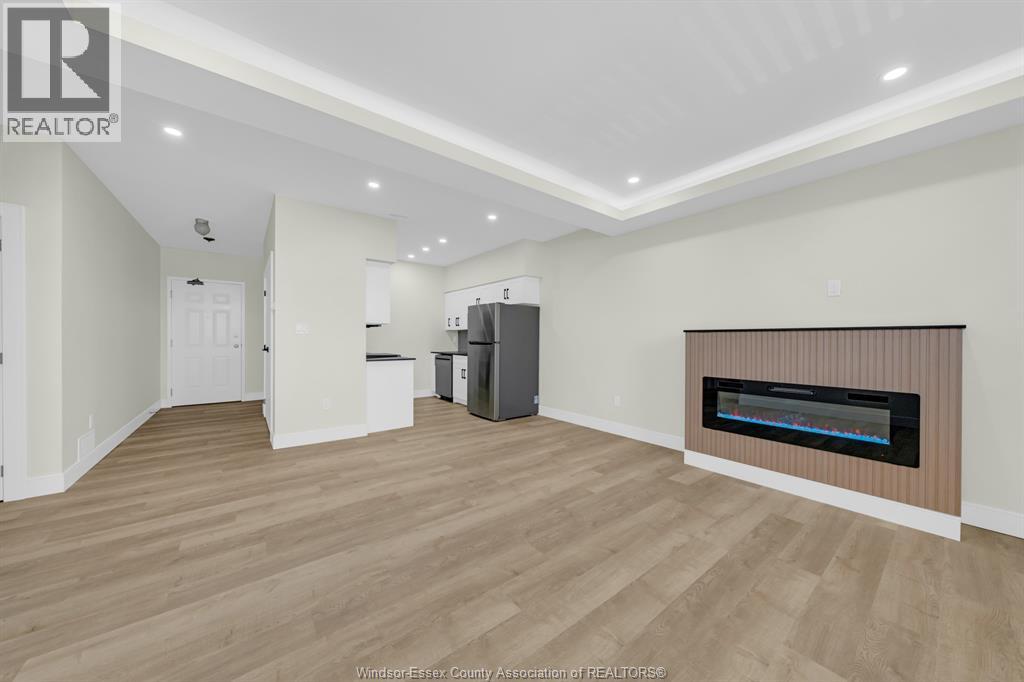 3177 Riverside Drive Unit# 305, Windsor, Ontario  N8Y 1A5 - Photo 1 - 26020492