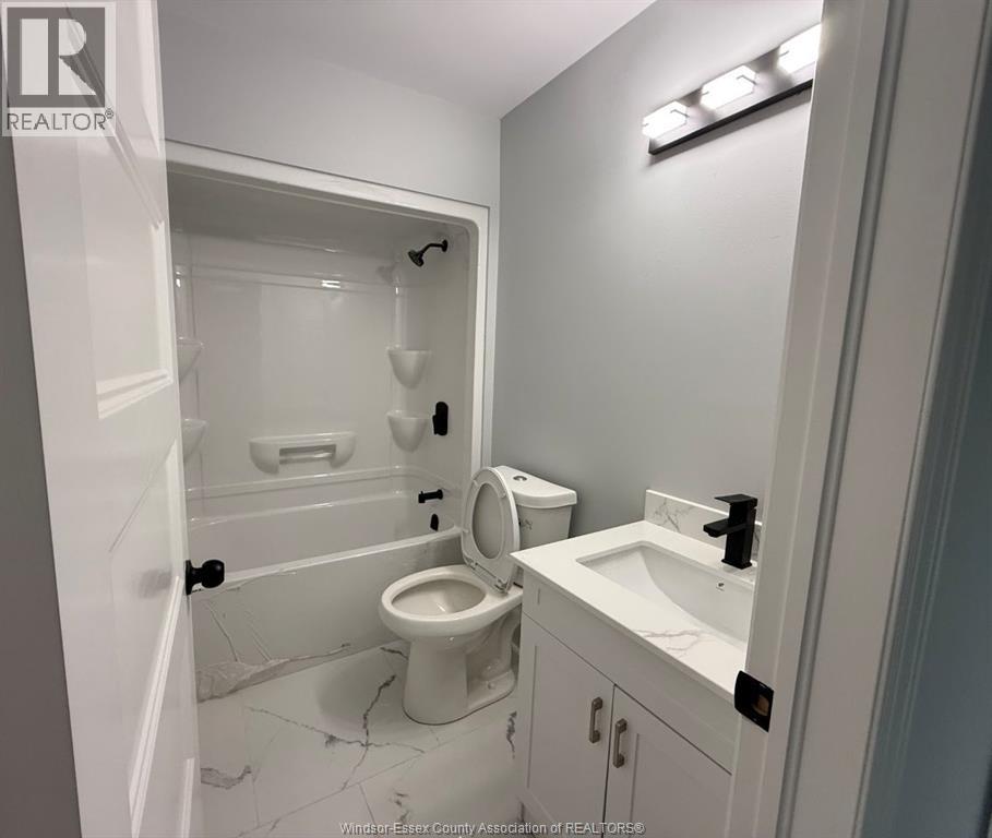 1904 Buckingham Drive Unit# 2, Windsor, Ontario  N8T 2B1 - Photo 2 - 26021958